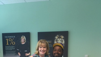 Attorney Deborah with client Photo